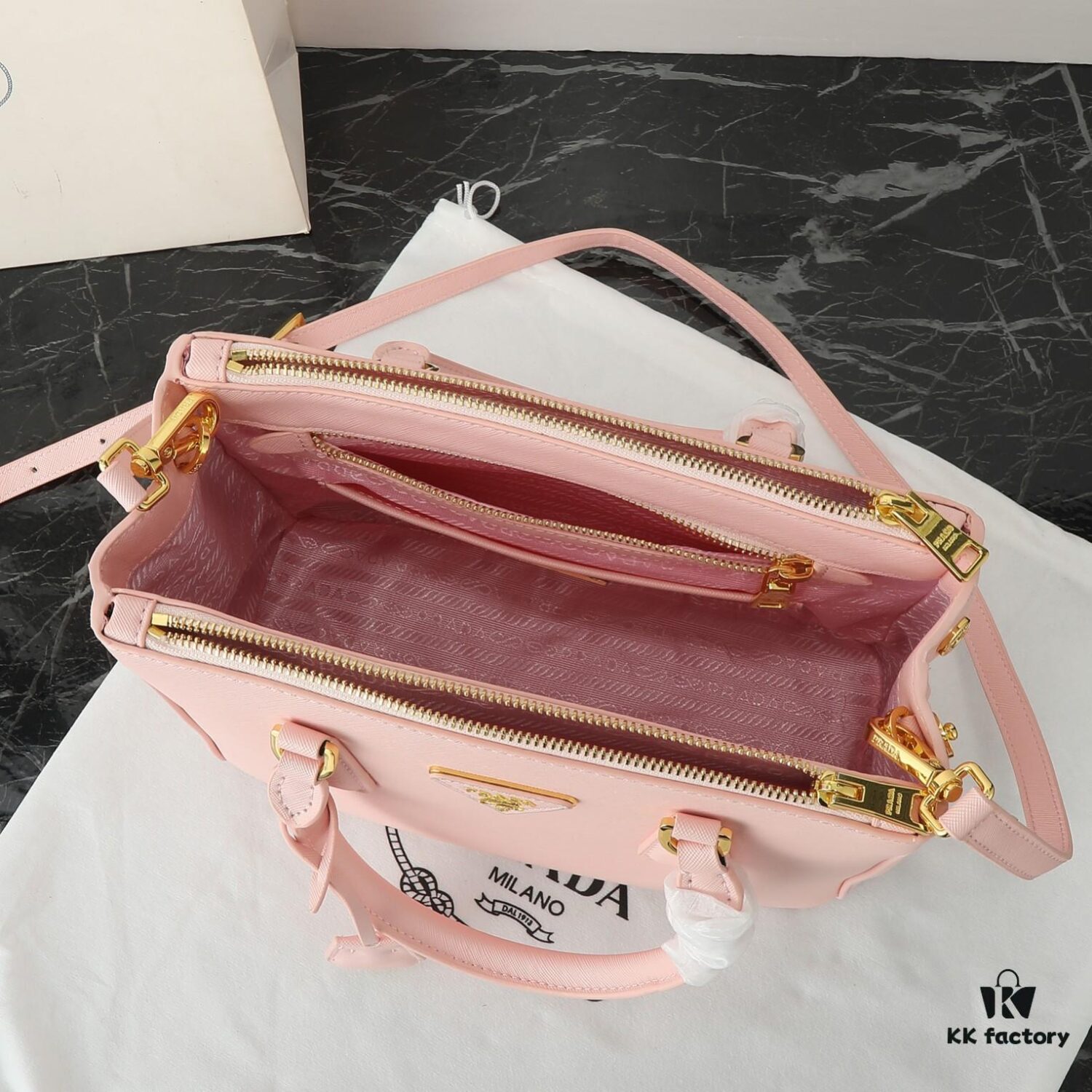 6930b9f06e68136f4d9ae61d Model 1018 House Super Hot Killer Bag, Saffiano Leather with Dual Top Handles, Detachable Adjustable Leather Shoulder Strap, Gold-Tone Hardware, Metal Logo on Triangular Leather Patch, Snap Button Closure on Side, Two Zippered Outer Pockets, Three Interior Pockets Including One Zippered Compartment, Prada-Branded Lining