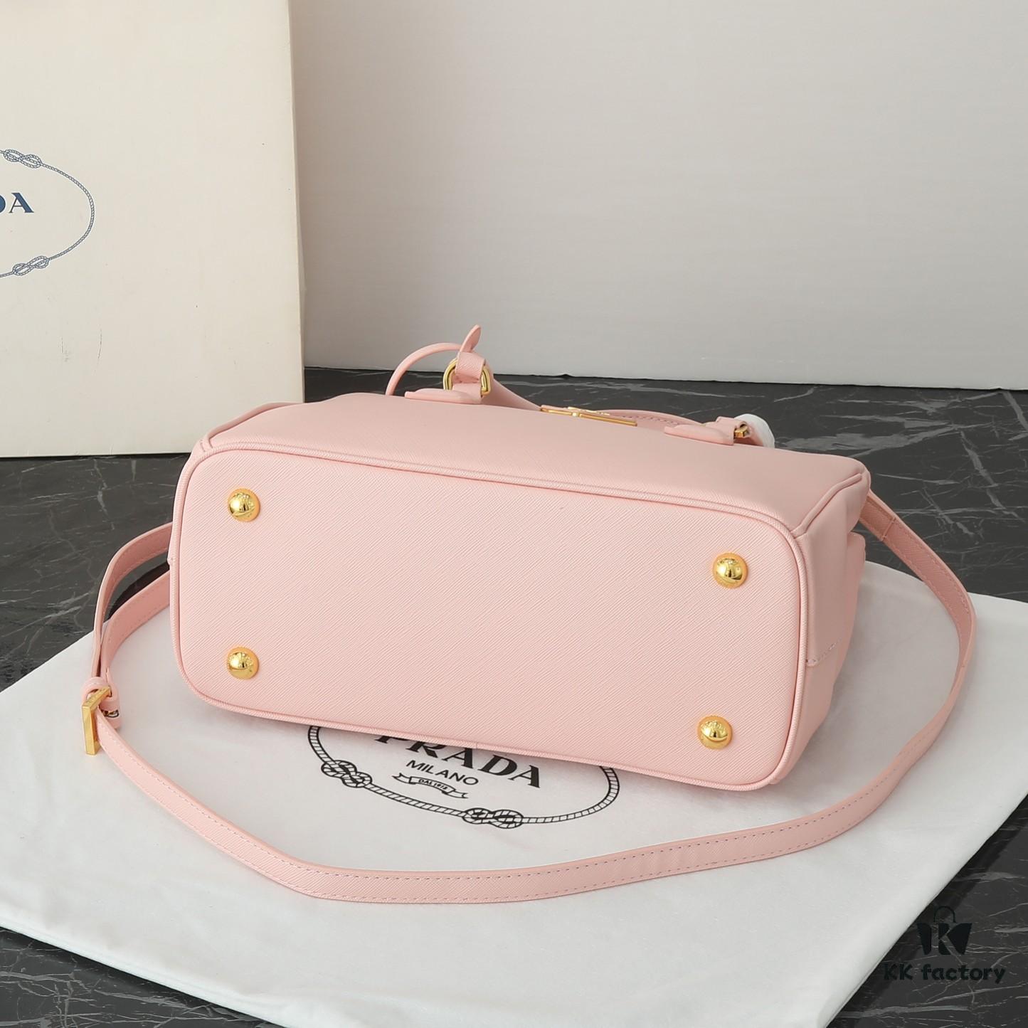 6930b9f36e68136f4d9ae620 Model 1018 House Super Hot Killer Bag, Saffiano Leather with Dual Top Handles, Detachable Adjustable Leather Shoulder Strap, Gold-Tone Hardware, Metal Logo on Triangular Leather Patch, Snap Button Closure on Side, Two Zippered Outer Pockets, Three Interior Pockets Including One Zippered Compartment, Prada-Branded Lining