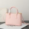 6930b9f36e68136f4d9ae621 Model 1018 House Super Hot Killer Bag, Saffiano Leather with Dual Top Handles, Detachable Adjustable Leather Shoulder Strap, Gold-Tone Hardware, Metal Logo on Triangular Leather Patch, Snap Button Closure on Side, Two Zippered Outer Pockets, Three Interior Pockets Including One Zippered Compartment, Prada-Branded Lining