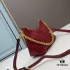 6930bb1d6e68136f4d9ae806 PRADA Bestseller Horn Bag (Leather Shoulder Strap + Chain Crossbody) - Vintage Meets Modern Fashion