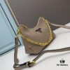 6930bb2c6e68136f4d9ae820 PRADA Must-Have Horn Bag with Detachable Chain Strap – A Perfect Blend of Vintage and Modern Fashion