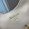 6930bb366e68136f4d9ae830 PRADA Must-Have Horn Bag with Detachable Chain Strap – A Perfect Blend of Vintage and Modern Fashion