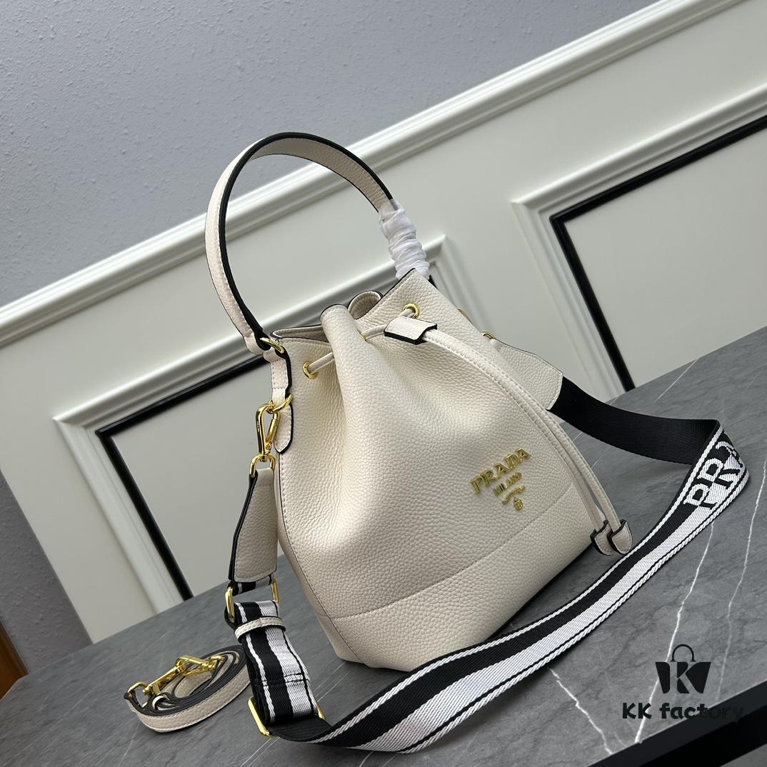 6930bb9e6e68136f4d9ae8d8 Prada New Arrival, Calfskin with Pebbled Texture, Dual Strap Design with Leather and Colorful Woven Strap, Stylish and Versatile Top Handle or Crossbody Bag