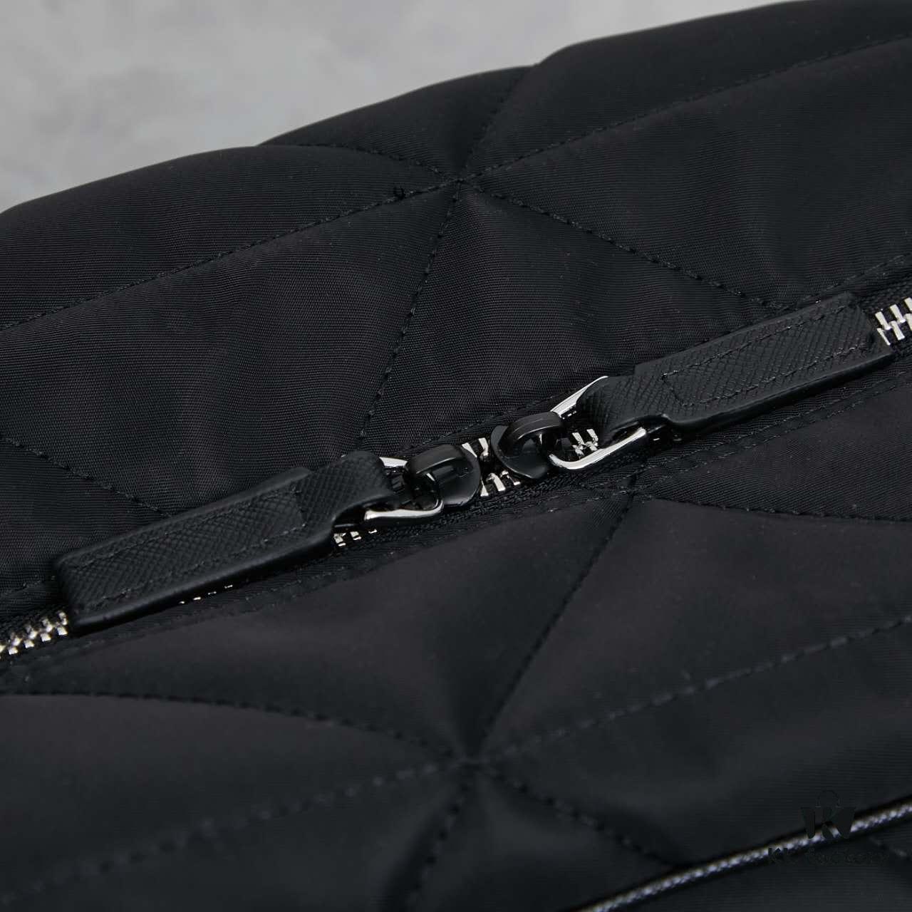 6930bbec6e68136f4d9ae964 Prada New Re-Nylon Travel Bag for Men and Women – Quilted Recycled Nylon with Iconic Design