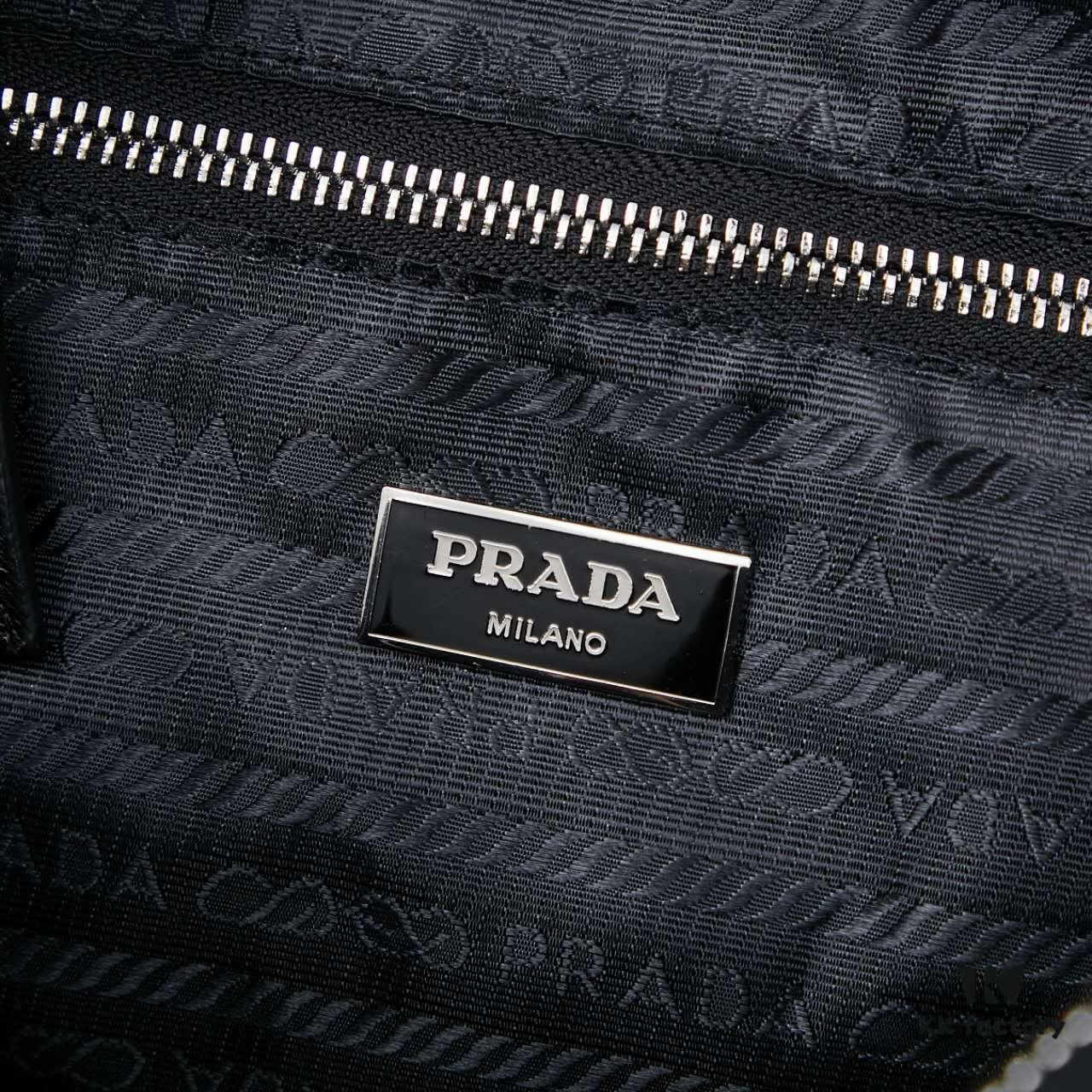 6930bbed6e68136f4d9ae968 Prada New Re-Nylon Travel Bag for Men and Women – Quilted Recycled Nylon with Iconic Design