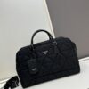 6930bc236e68136f4d9ae9d0 Prada New Re-Nylon Travel Bag for Men and Women – Quilted Regenerated Nylon with Iconic Design