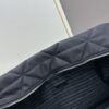 6930bc286e68136f4d9ae9d9 Prada New Re-Nylon Travel Bag for Men and Women – Quilted Regenerated Nylon with Iconic Design