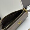 6930bd6b6e68136f4d9aebf9 PRADA Flip Zip Champion Edition with Dual Shoulder Straps (Striped Wide Fabric Strap & Extended Leather Shoulder Pad)