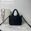 6930beba6e68136f4d9aee01 Prada Nylon Cotton Tote Bag (with Long Shoulder Strap)