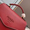 6930bfa36e68136f4d9aef7a PRADA Fashion Head-Covering Bag in Deer Grain Leather with Ostrich Texture