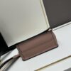6930c0706e68136f4d9af0ed PRADA - Bestselling Flap Top Bag with Letter-Woven Wide Fabric Strap