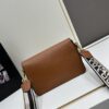 6930c07e6e68136f4d9af104 PRADA - Bestselling Flap Bag with Letter-Print Wide Fabric Strap