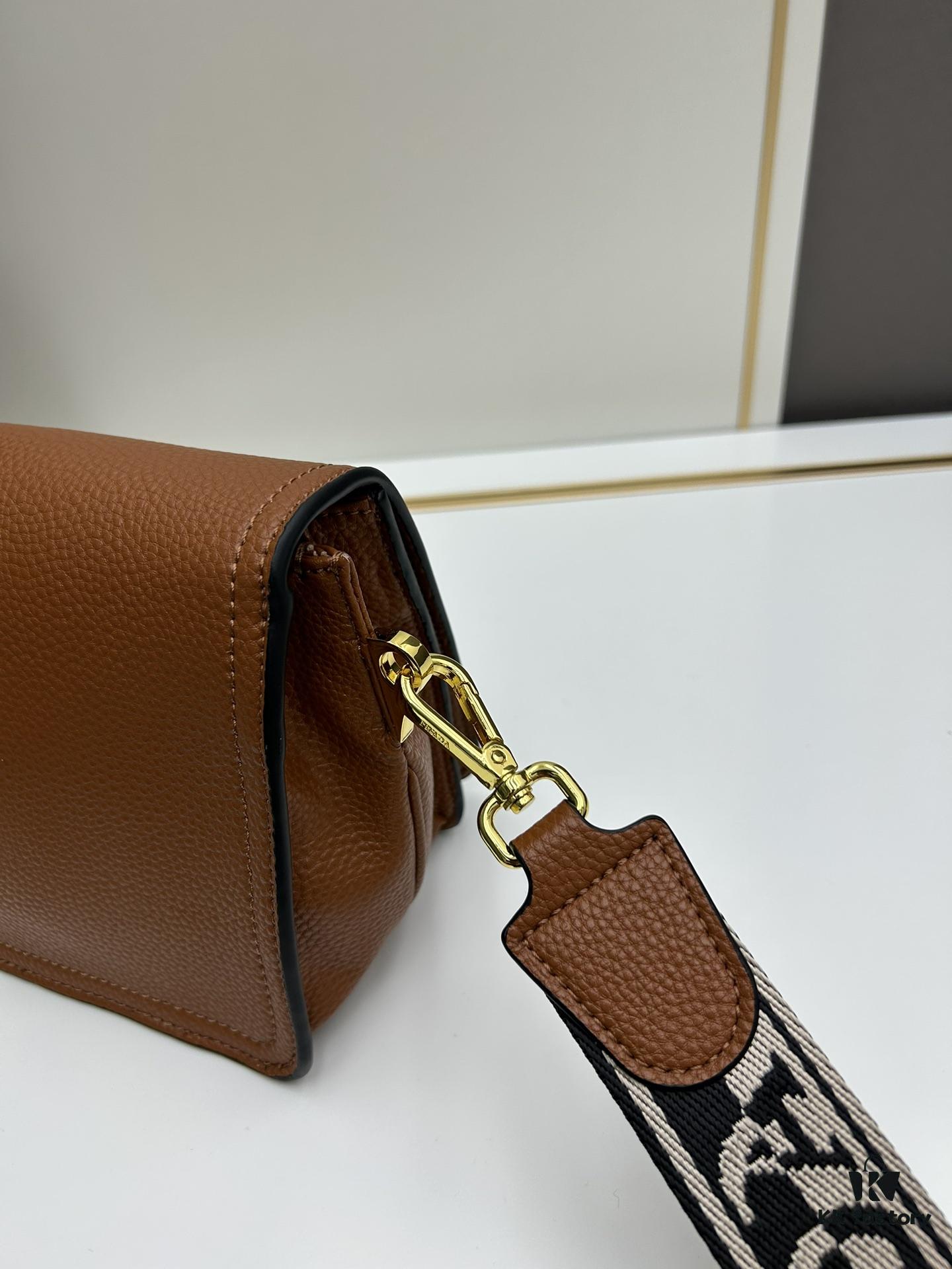 6930c07e6e68136f4d9af107 PRADA - Bestselling Flap Bag with Letter-Print Wide Fabric Strap