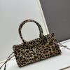 6930c1056e68136f4d9af1e3 Prada Holidays ✨ This year's Holiday collection is absolutely stunning! The new leopard-print pony hair material on the best-selling bag design represents a wild, bold expression. The lambswool and black velvet classic style is also a must-have essential for the end-of-year holiday season.