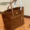 6930c1286e68136f4d9af21f Suede Shopping Bag