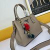 New Arrival 340🔥 Premium Quality🔥 Prada 2020 Mouse Year Edition [Rose] (Free Doll Keychain with Purchase) – Timeless Classic Bestseller, Fine Grain Calfskin, Light Gold Hardware, Rounded Silhouette, Wide Strap, Elegant Texture