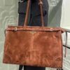 6930c1826e68136f4d9af29a Sanded, size 38x30x12, model number 2452. Prada's recent unboxing joy