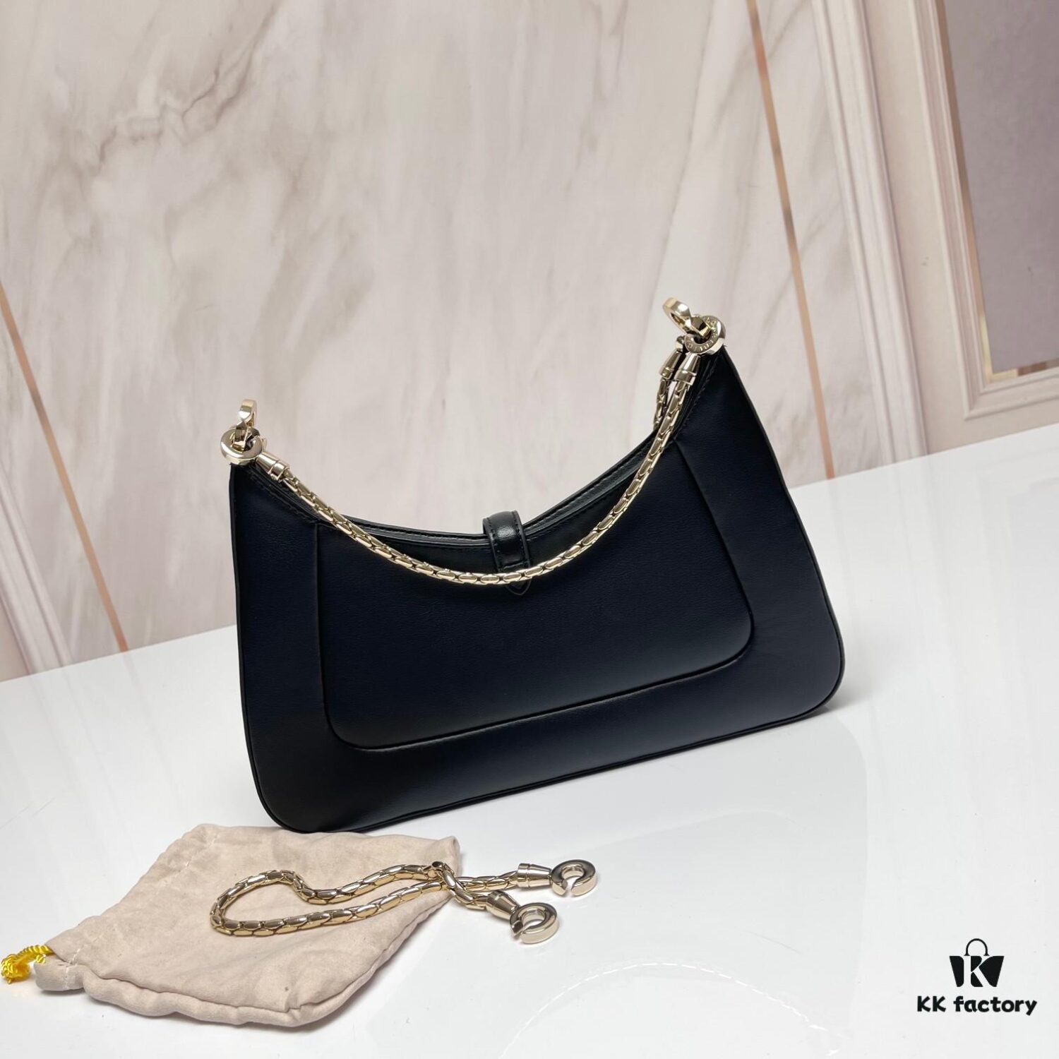6930c6e66e68136f4d9afba2 BVLGARI SERPENTI BAIA Small Shoulder Bag in Silvered Textured Calfskin with Snake Head Clasp