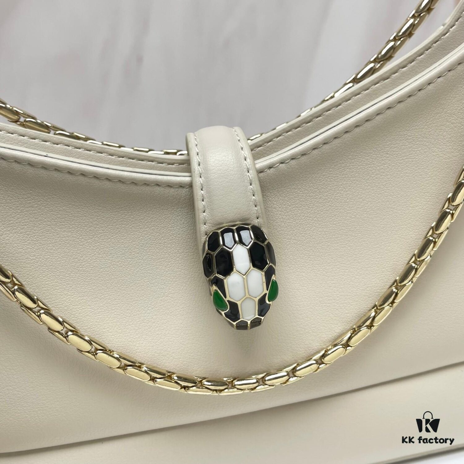 6930c6eb6e68136f4d9afbab BVLGARI SERPENTI BAIA Small Shoulder Bag in Textured Silver Calfskin with Snake-Head Clasp