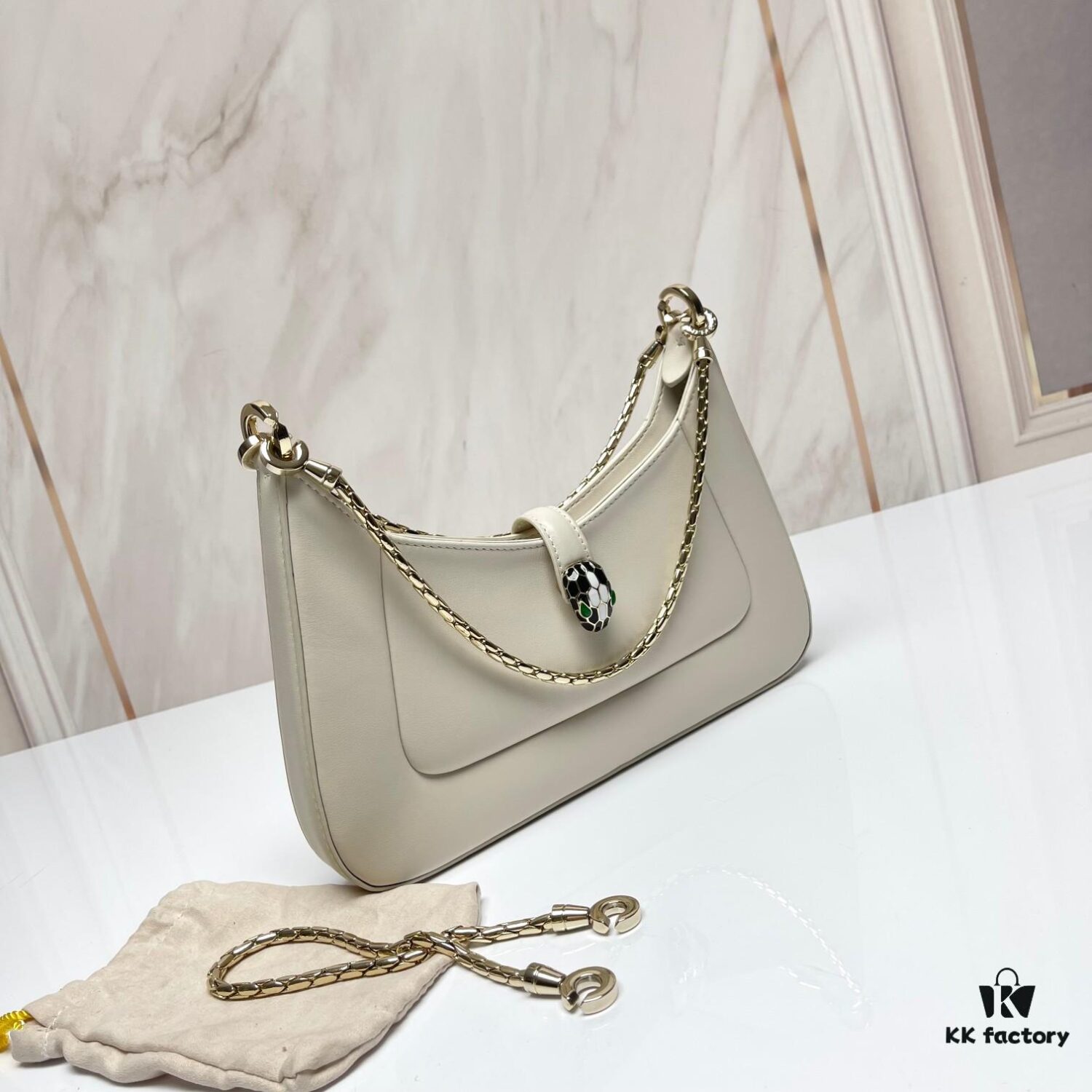 6930c6eb6e68136f4d9afbac BVLGARI SERPENTI BAIA Small Shoulder Bag in Textured Silver Calfskin with Snake-Head Clasp