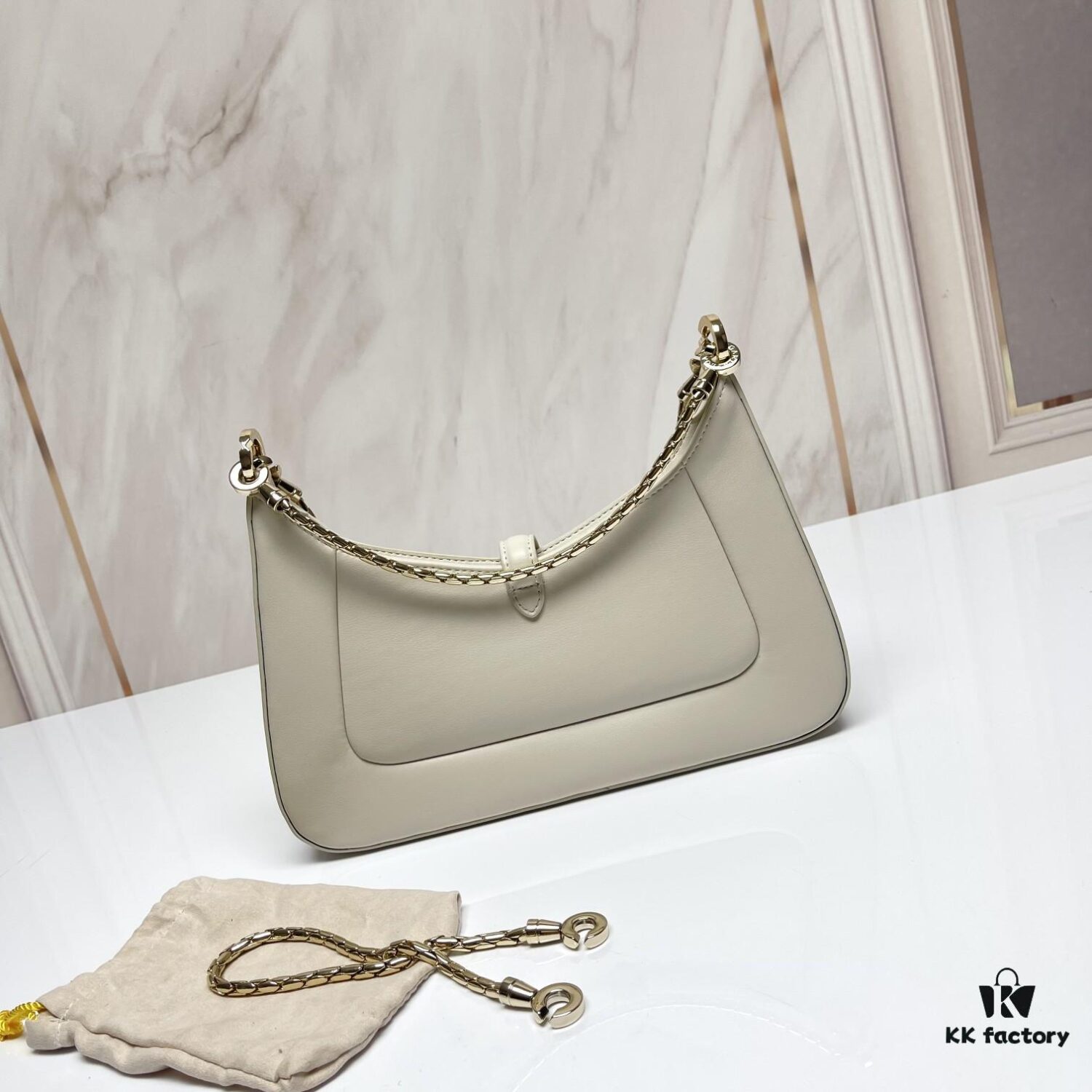 6930c6ec6e68136f4d9afbad BVLGARI SERPENTI BAIA Small Shoulder Bag in Textured Silver Calfskin with Snake-Head Clasp