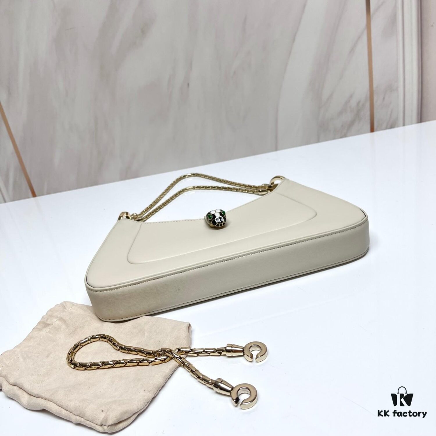 6930c6ed6e68136f4d9afbae BVLGARI SERPENTI BAIA Small Shoulder Bag in Textured Silver Calfskin with Snake-Head Clasp