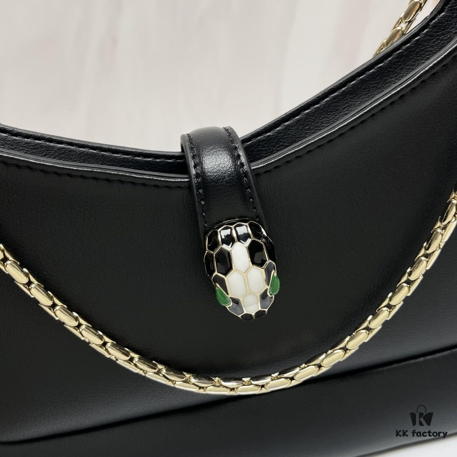 6930c6ee6e68136f4d9afbb1 BVLGARI SERPENTI BAIA Small Shoulder Bag in Silvered Textured Calfskin with Snake Head Clasp