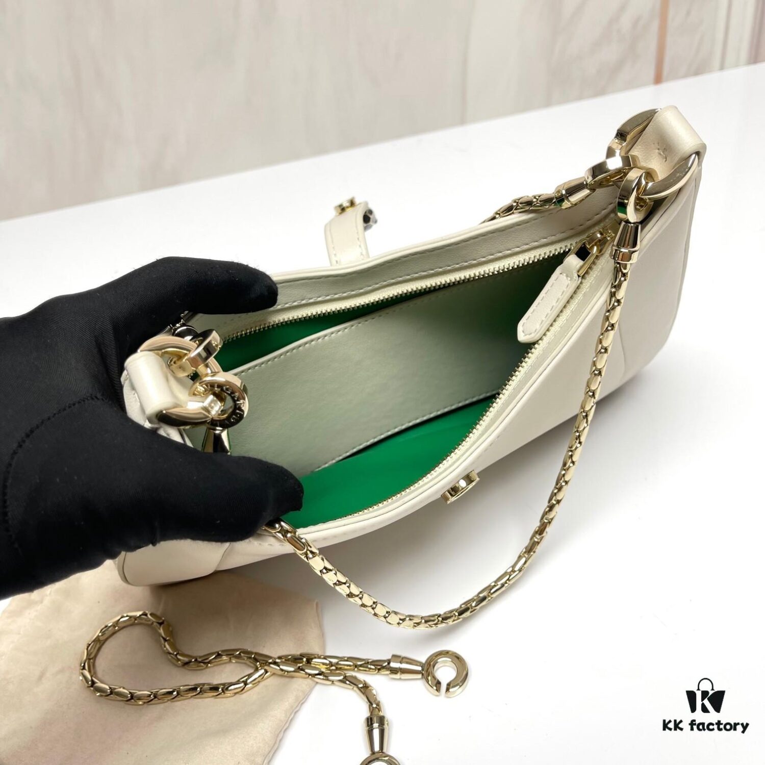 6930c6ee6e68136f4d9afbb2 BVLGARI SERPENTI BAIA Small Shoulder Bag in Textured Silver Calfskin with Snake-Head Clasp