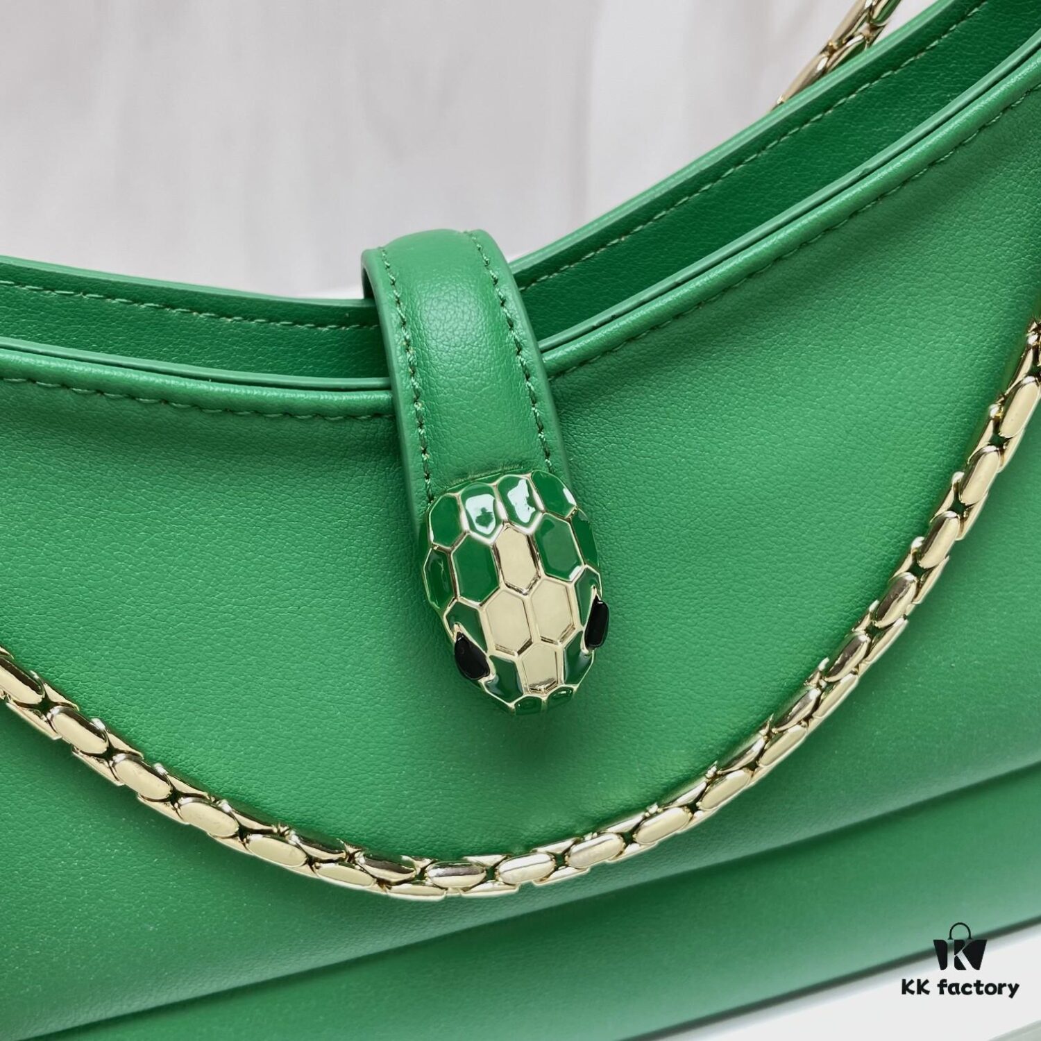 6930c6ef6e68136f4d9afbb5 BVLGARI SERPENTI BAIA Small Shoulder Bag in Textured Silver Calfskin with Snake-Head Magnetic Clasp