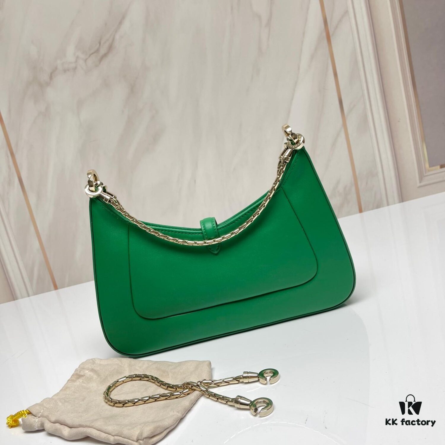 6930c6f16e68136f4d9afbb6 BVLGARI SERPENTI BAIA Small Shoulder Bag in Textured Silver Calfskin with Snake-Head Magnetic Clasp