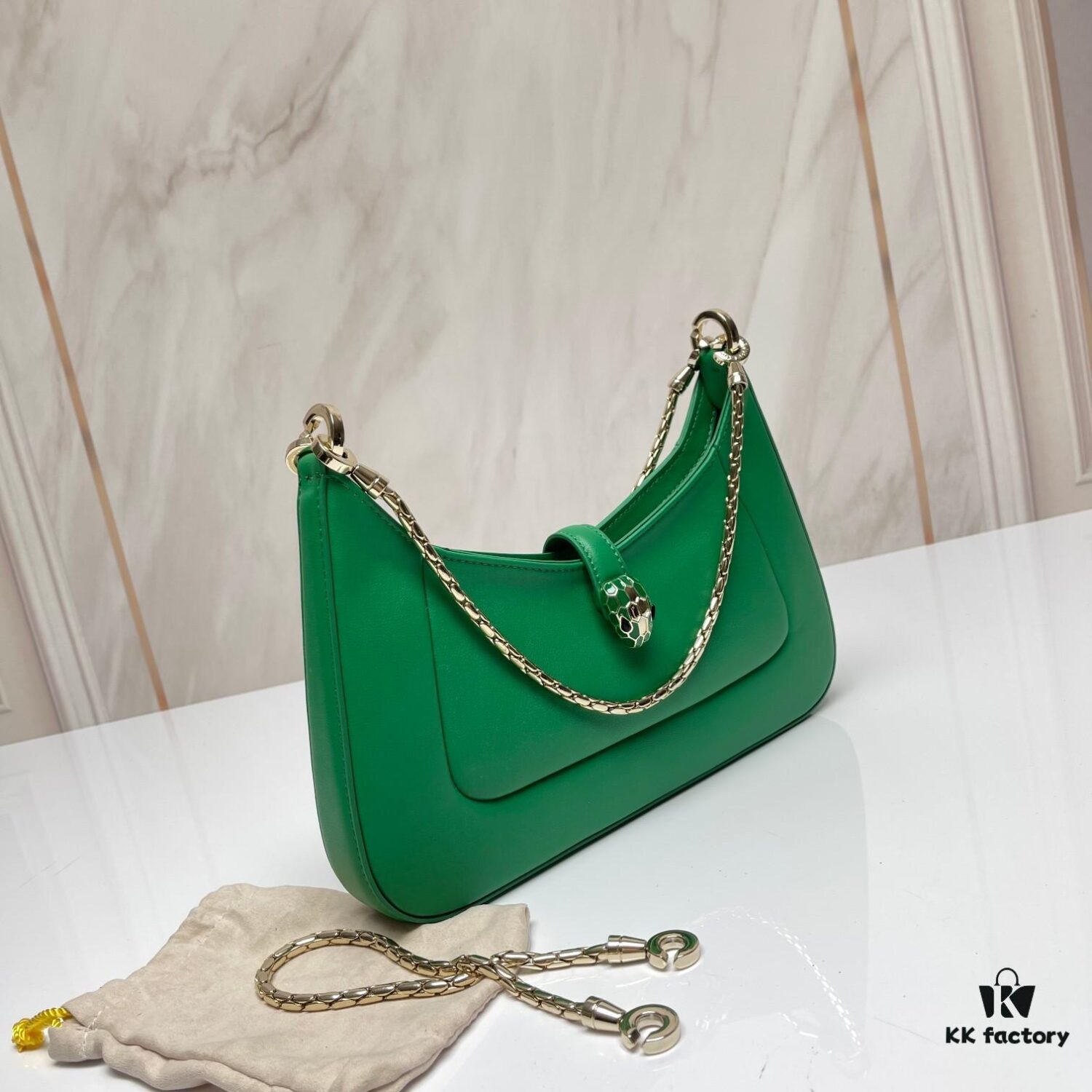 6930c6f16e68136f4d9afbb7 BVLGARI SERPENTI BAIA Small Shoulder Bag in Textured Silver Calfskin with Snake-Head Magnetic Clasp