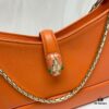 6930c6fe6e68136f4d9afbce BVLGARI SERPENTI BAIA Small Shoulder Bag in Textured Silver Calfskin with Snake-Head Clasp
