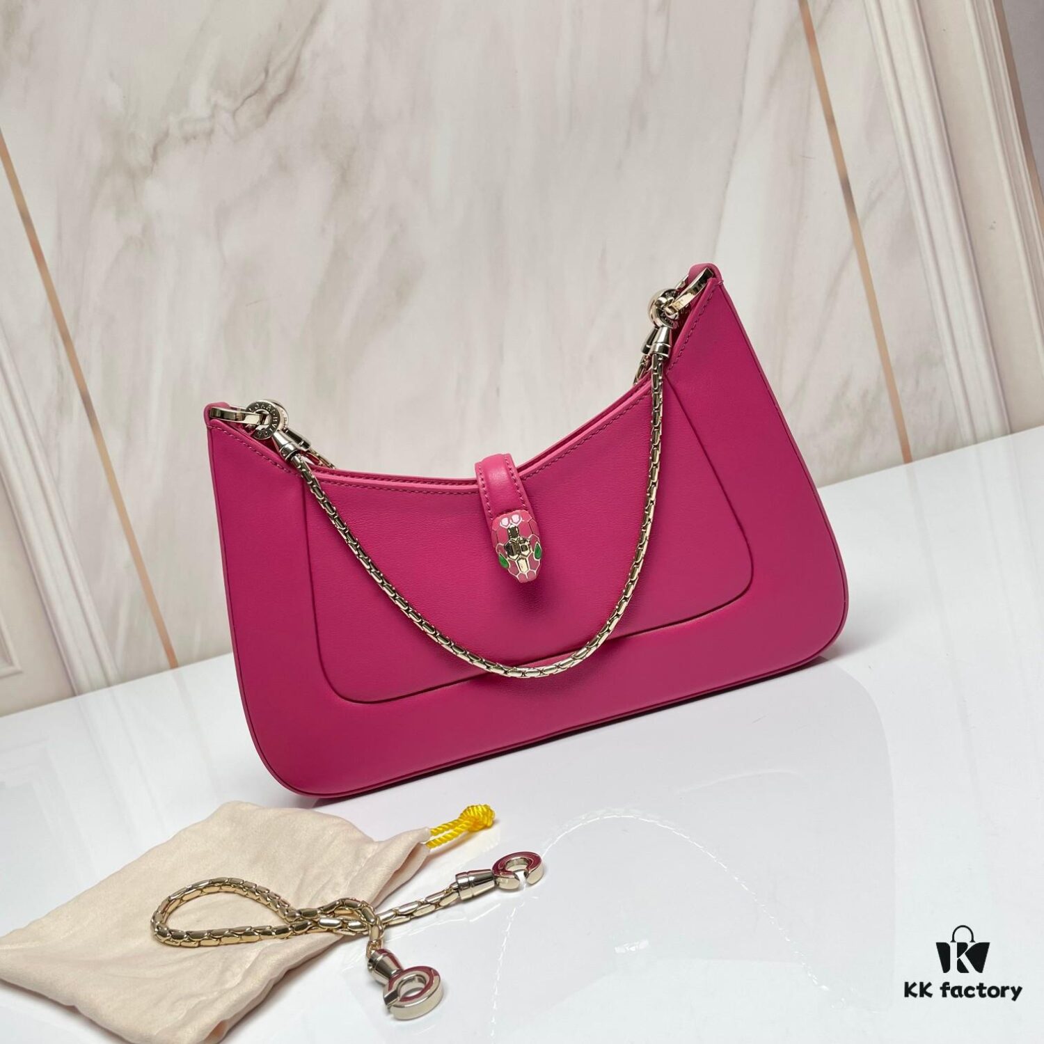 6930c7016e68136f4d9afbd4 BVLGARI SERPENTI BAIA Small Shoulder Bag in Silvered Textured Calfskin with Snake-Head Clasp