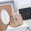 6930cb3a6e68136f4d9b02f3 New Arrival Saffiano Leather Rose-Inspired Street-Style Bag | YSL's Muse Must-Have