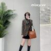 6930cbb56e68136f4d9b03b3 New YSL Shoulder Bag, Soft and Stylish in Black and Caramel