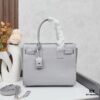 6930cc4b6e68136f4d9b04a0 New Crocodile-Texture Rose-Inspired Streetwear Bag | YSL's Ultimate Celebrity Muse
