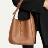 6930ceeb6e68136f4d9b0909 New YSL Shoulder Bag, Soft and Stylish in Black and Caramel