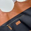 6930cf546e68136f4d9b09bc New YSL Saint Laurent Suede Icare Quilted Tote Bag in Black and Caramel