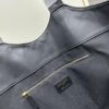 6930cf5b6e68136f4d9b09c5 New YSL Icare Suede Quilted Tote Bag in Black and Caramel