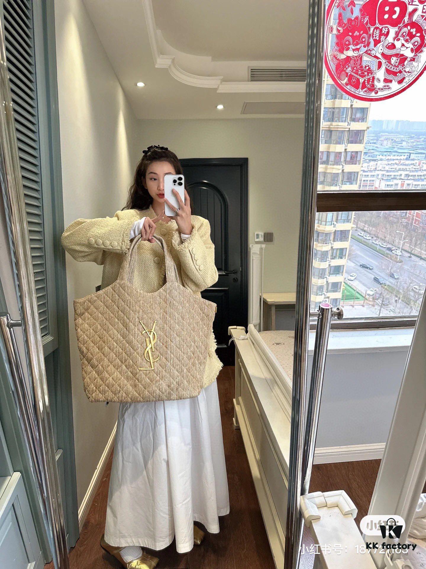 6930cf5c6e68136f4d9b09c8 New YSL Oversized Logo Quilted Tote Bag