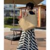 6930cf6d6e68136f4d9b09de New YSL Oversized Logo Quilted Tote Bag