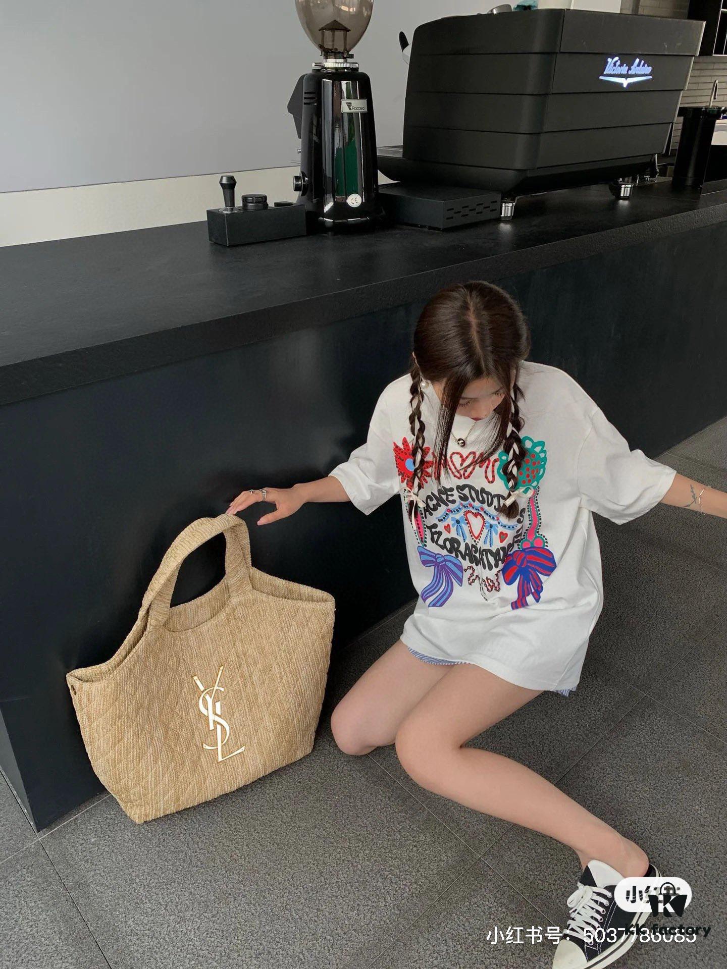 6930cf7c6e68136f4d9b09f2 New YSL Oversized Logo Quilted Tote Bag