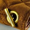6930d0f16e68136f4d9b0c32 New YSL Icare Suede Quilted Tote Bag in Black and Caramel