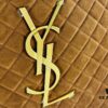 6930d0f76e68136f4d9b0c3c New YSL Icare Suede Quilted Tote Bag in Black and Caramel