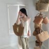 6930d3ed6e68136f4d9b10c8 New YSL Straw Bag – Must-Have for Summer