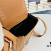 6930d6326e68136f4d9b1413 New YSL Hobo Series Mini Vertical Crossbody Bag in Smooth Calfskin with Antique Metal Logo Closure