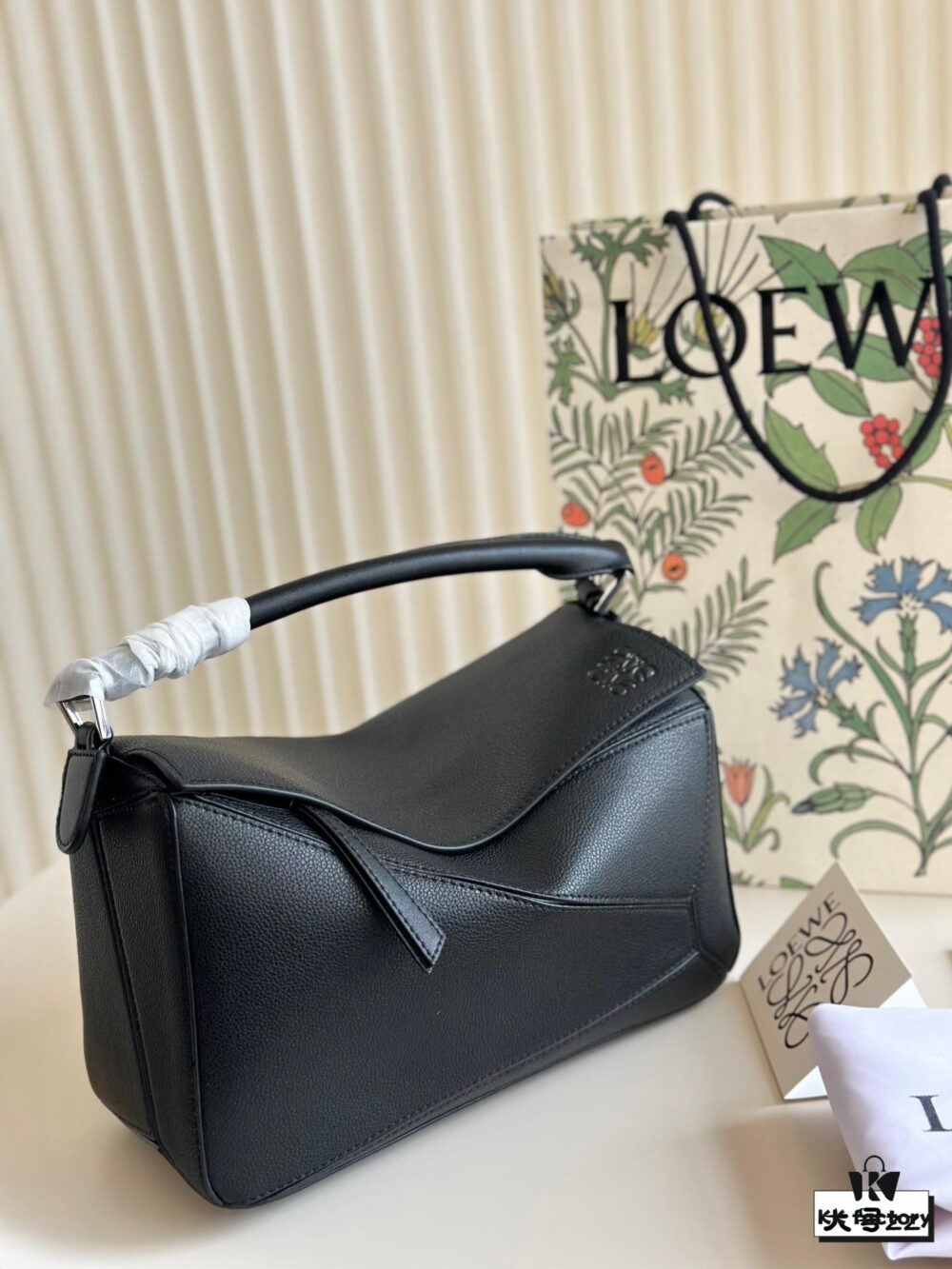 6930d6f86e68136f4d9b154c Loewe Geometric Crinkled Leather