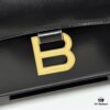 6930d99e6e68136f4d9b18e0 Hot Selling Genuine BALENCIAGA Hourglass Crossbody Bag in Black and Gold Plain Texture - Large Size