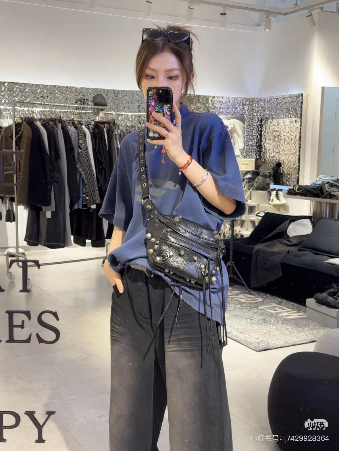 6930e0e26e68136f4d9b226b Balenciaga LE CAGOLE MEDIUM BUM BAG IN BLACK TEXTURED LAMB LEATHER