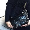 6930e0e96e68136f4d9b2273 Balenciaga LE CAGOLE MEDIUM BUM BAG IN BLACK TEXTURED LAMB LEATHER